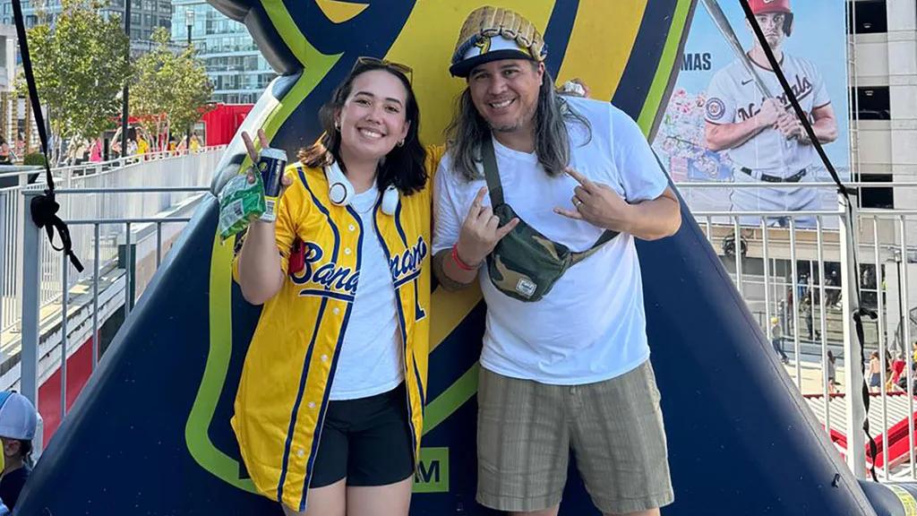Angelo amd Raiana at a Savannah Bananas game.